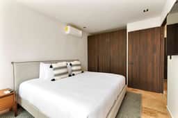 Stylish 1BR Condo with Private Pool & Balcony - Image 2