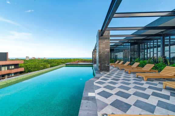 2BR Condo with Jacuzzi Near Habitas Beach - Image 1