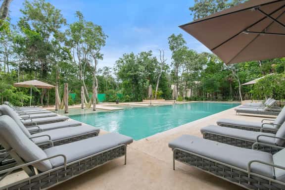 Stylish 1BR Condo with Private Pool & Balcony - Image 1