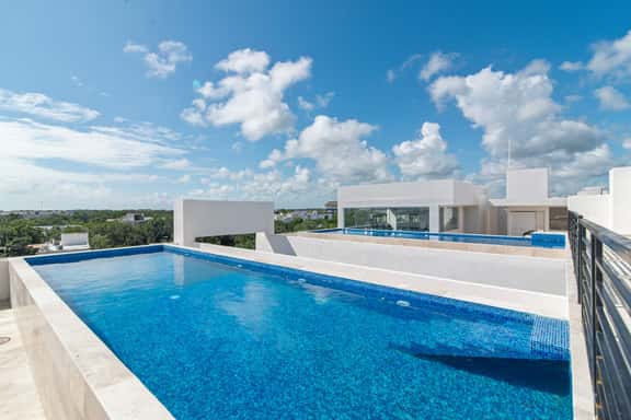 2BR Condo with Rooftop Pool & Gym in Aldea Zama - Image 1
